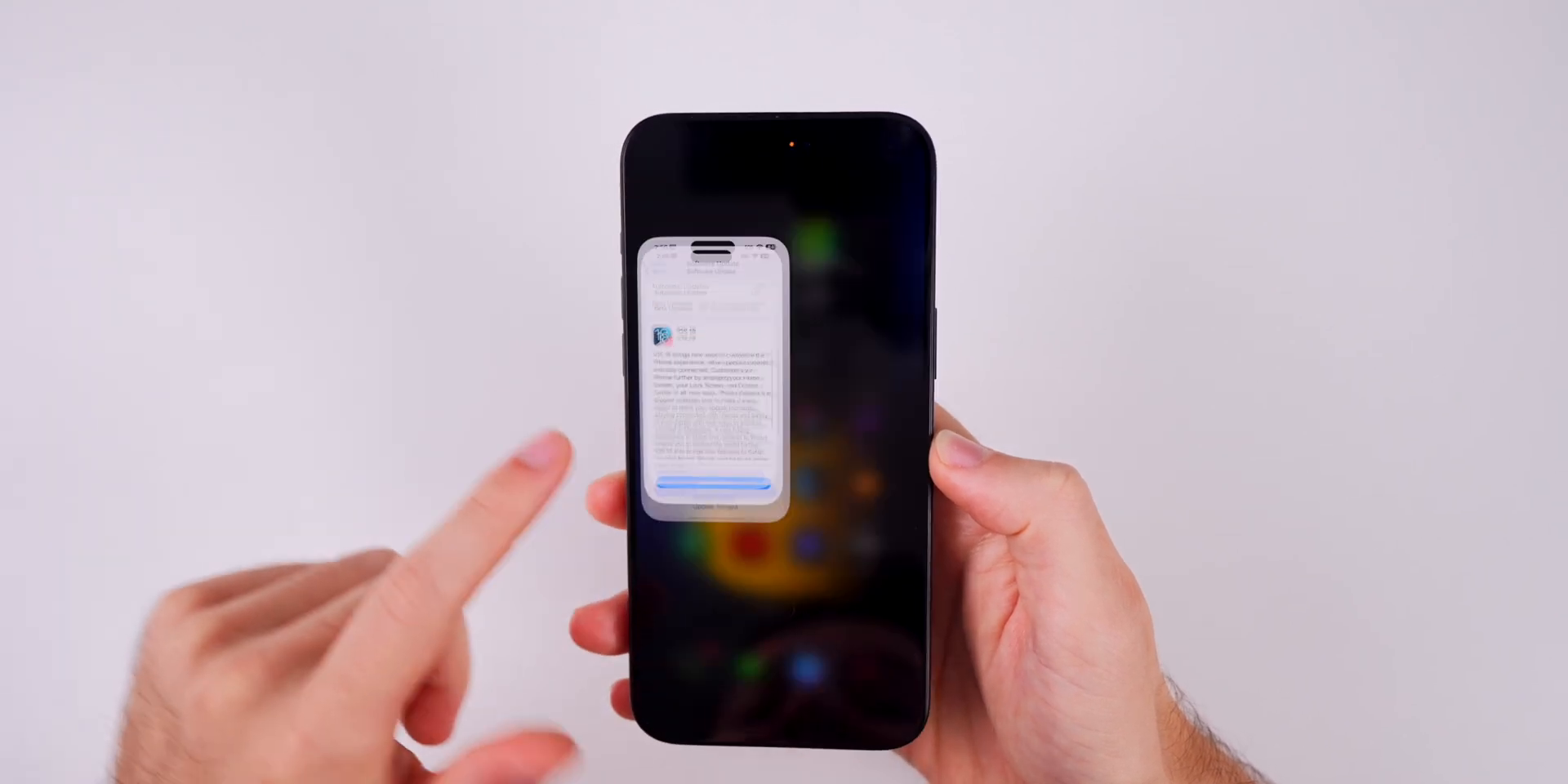 Digital Reach Hands holding iPhone displaying app update notification.