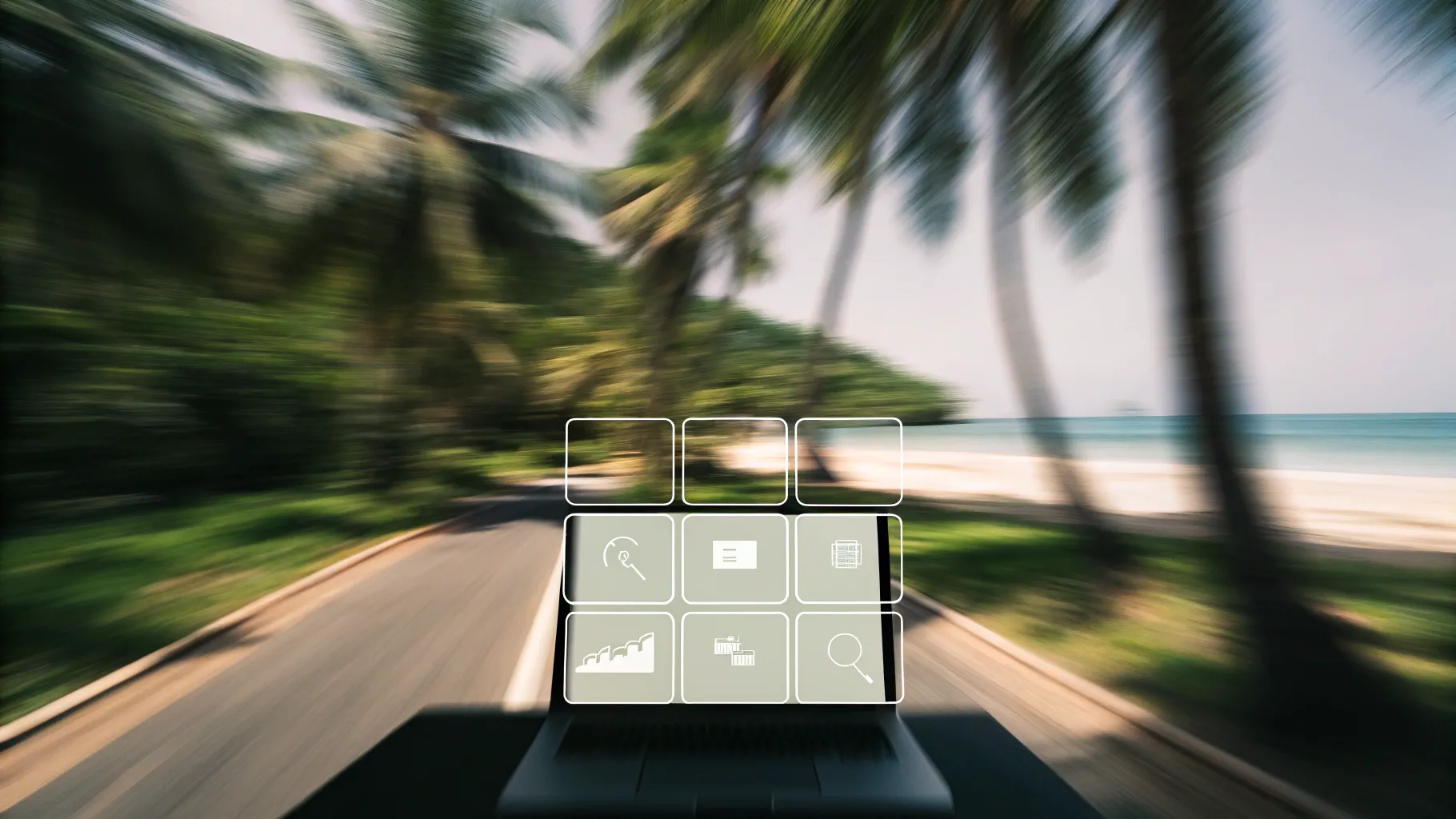 Digital Reach, Laptop on road with beach and palm trees, showing productivity and travel.